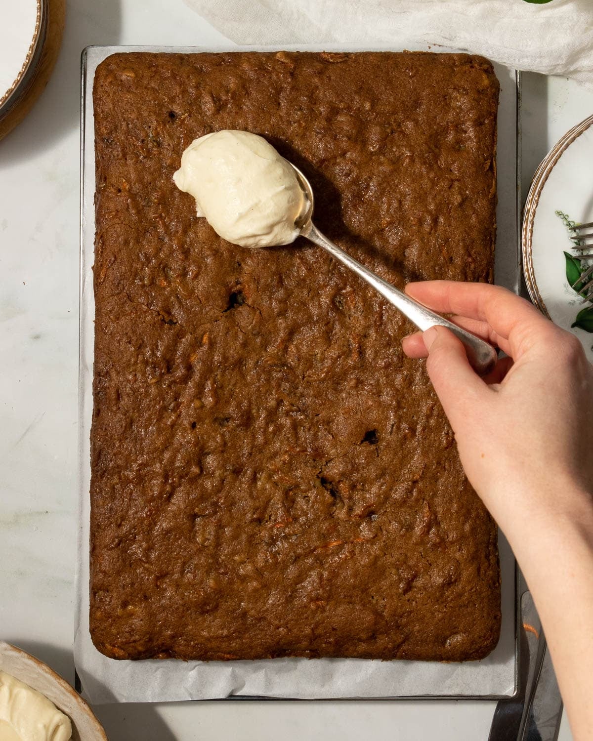 Bake the cake. Let cool completely before frosting.