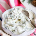 A bowl full of tartare sauce with a spoon