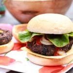 A yummy vegan seitan burger in a bun with all the trimmings.