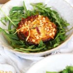 Harissa Mushroom on a plate with rocket leaves