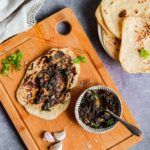 Garlic Butter and Flatbreads on a board