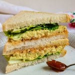 Stack of vegan egg salad sandwiches image for pinterest.