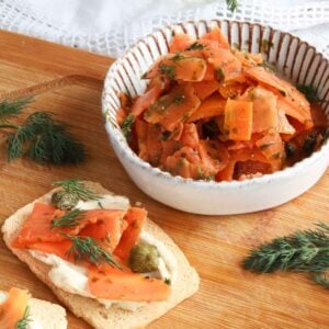 Vegan smoked salmon in a bowl and on a cracker.