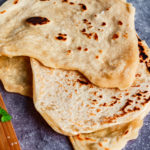 Stack of chickpea flour flatbreads.