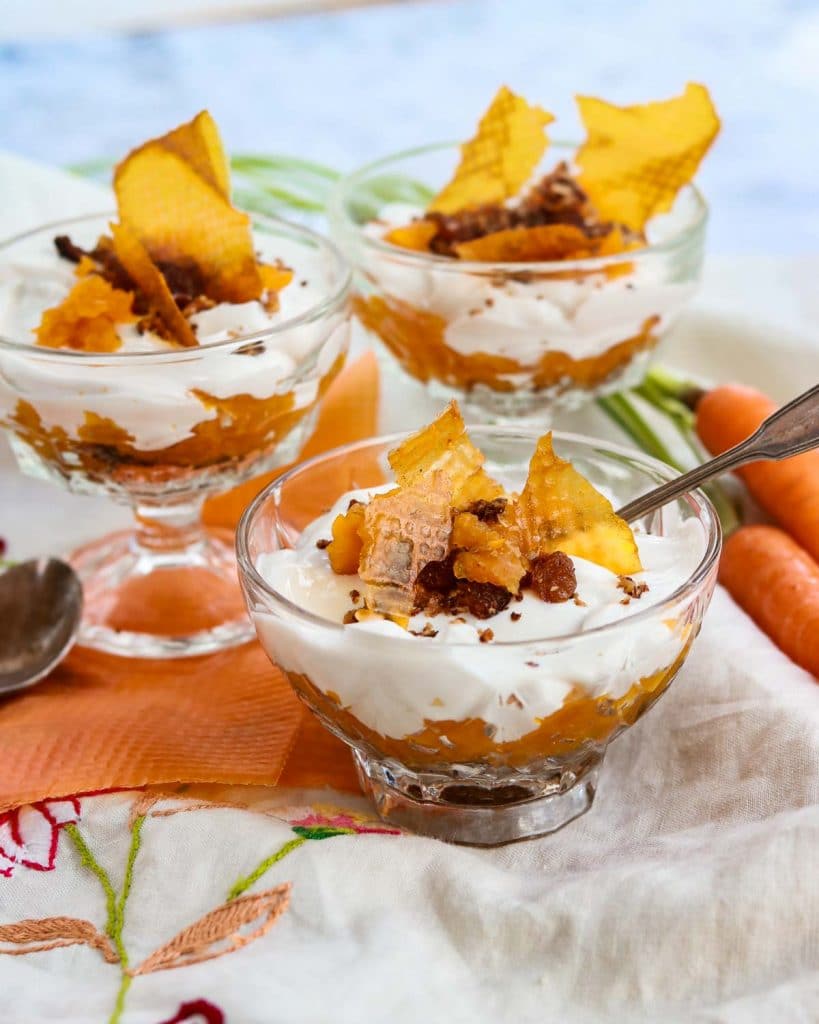 vegan carrot cake parfaits in glasses with spoons