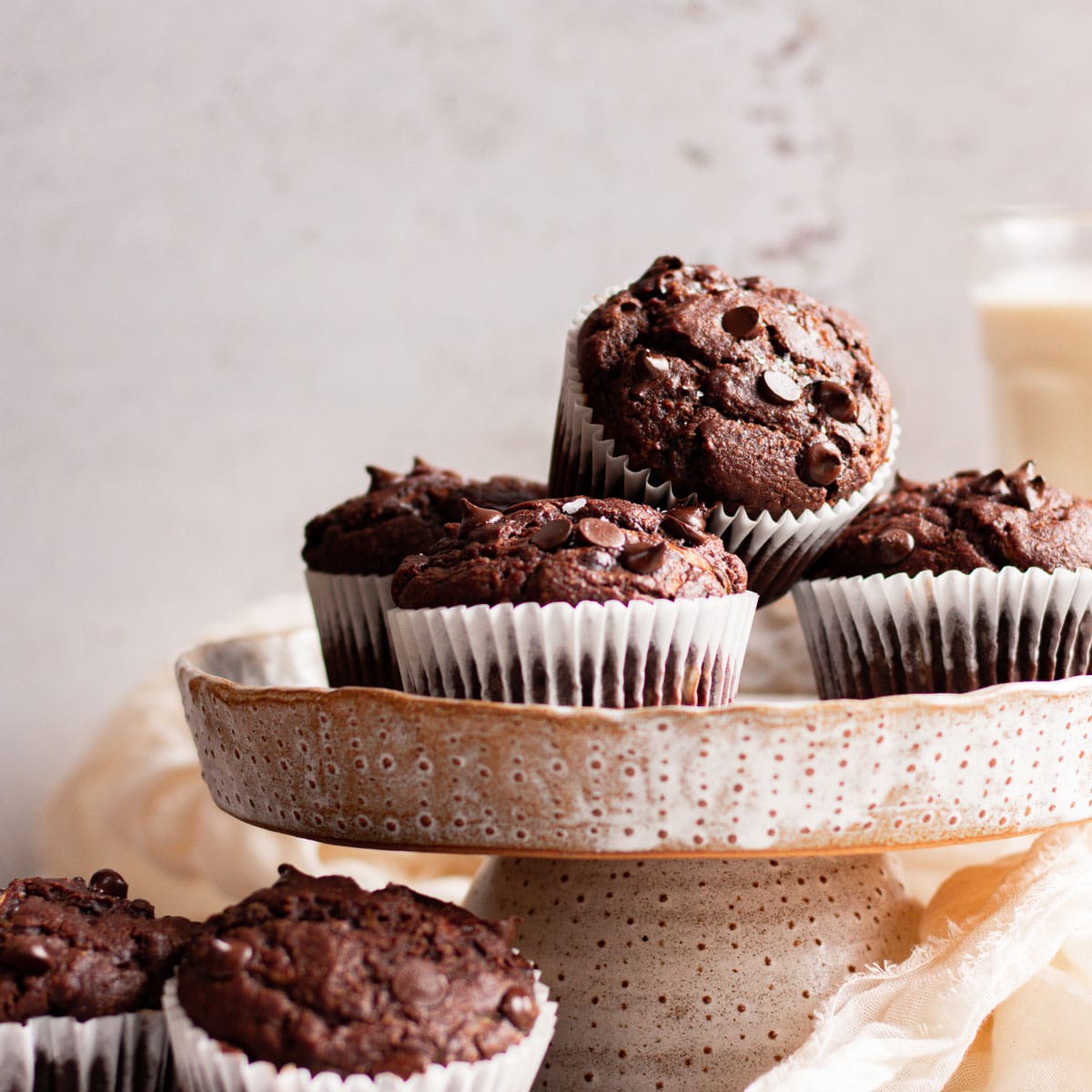 chocolate vegan Zucchini muffins in a stack