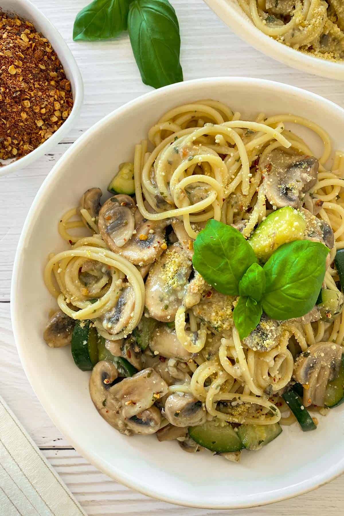 Mushroom zucchini pasta in a bowl