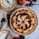 Apple and Blackberry Cake ready to be eaten on a plate