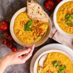 creamy vegan daal in bowls with a spoon