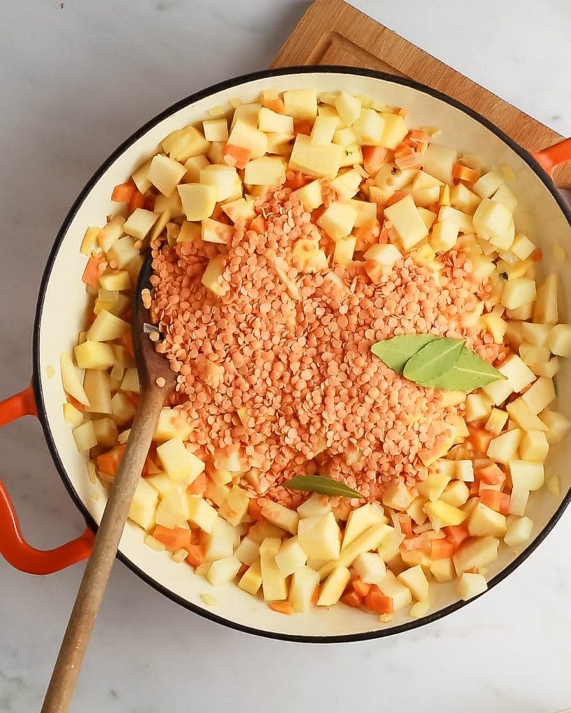 Add red lentils and herbs.