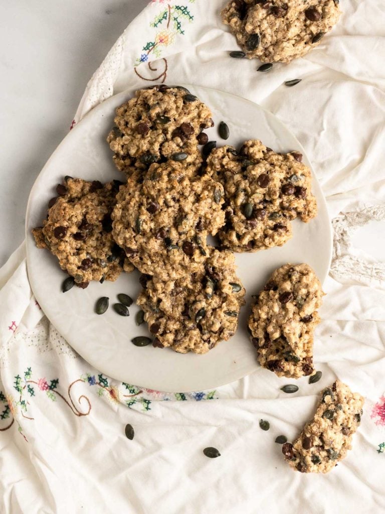 A plate of vegan oatmeal chocolate chip cookies.