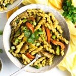 vegan rasta pasta in a bowl with a fork.