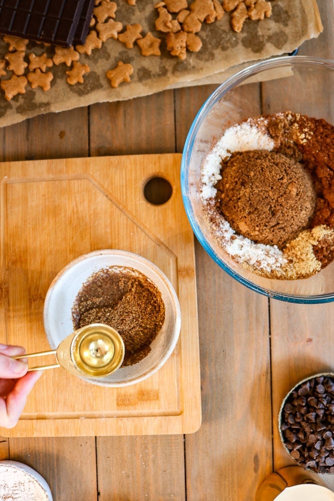 adding water to flaxseed in a bowl.