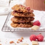 A pile of raspberry white chocolate cookies ready to eat.