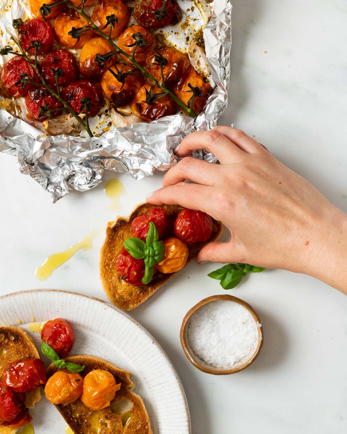 Roasted tomatoes just out of the air fryer and spread on some bruschetta.