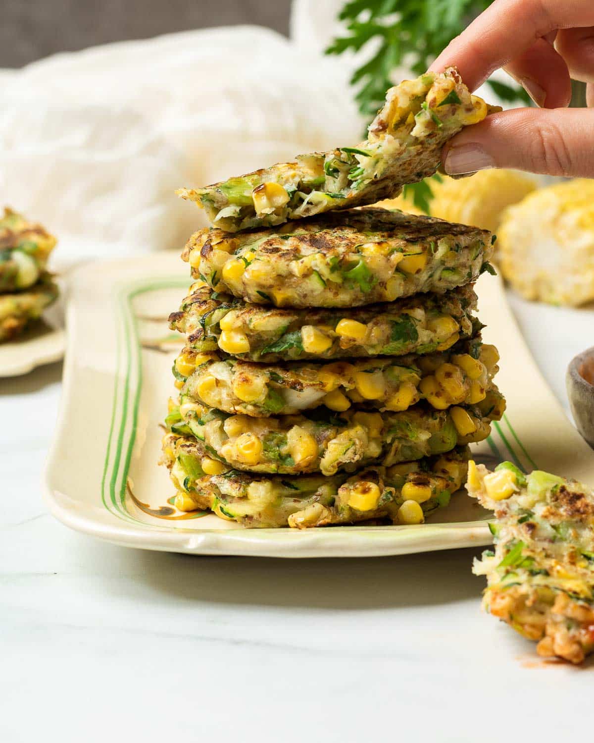 A stack of sweetcorn and courgette fritters, ready to eat!