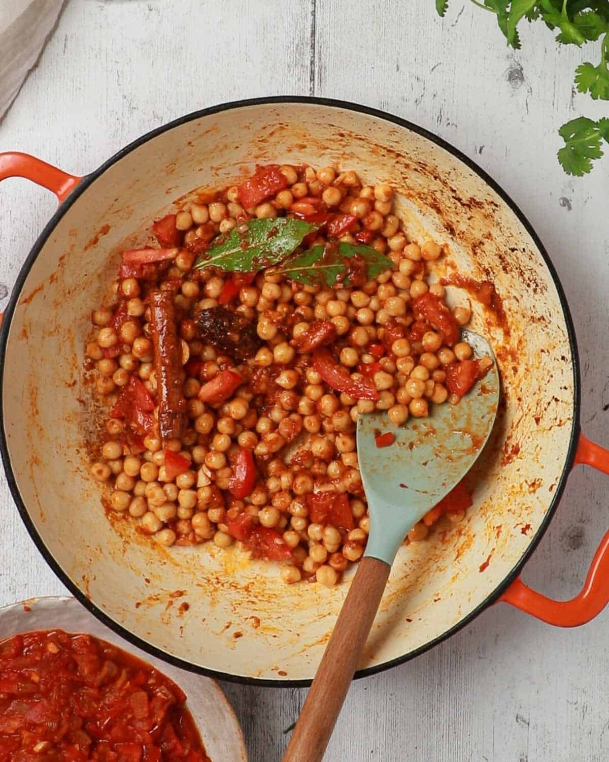 Mix the spices in with the chickpeas ans cook until fragrant to release their full spice flavour.