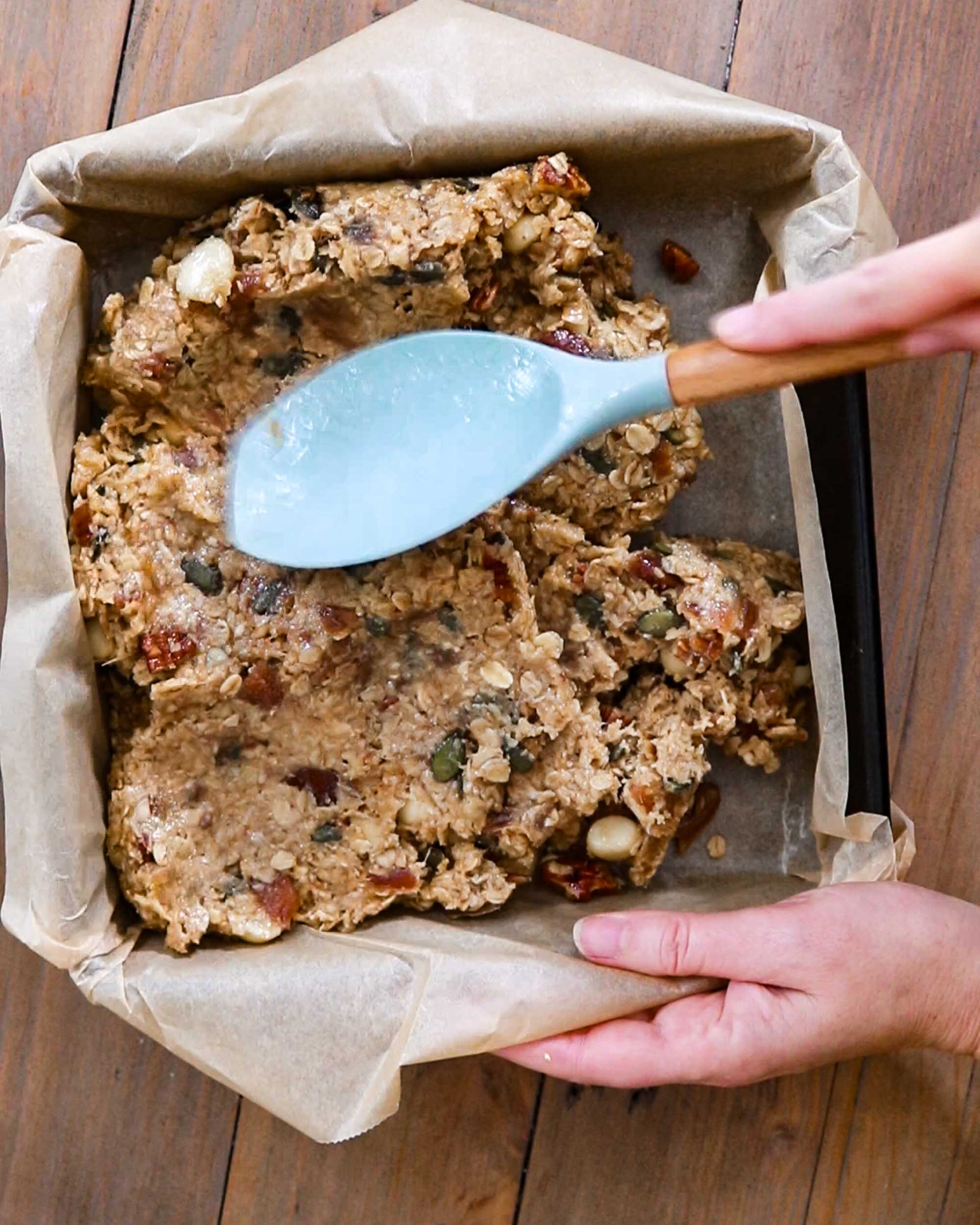 Push and spread out the flapjack mixture into a lined tin.