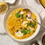 Carrot and Parsnip Soup in a bowl ready to eat.