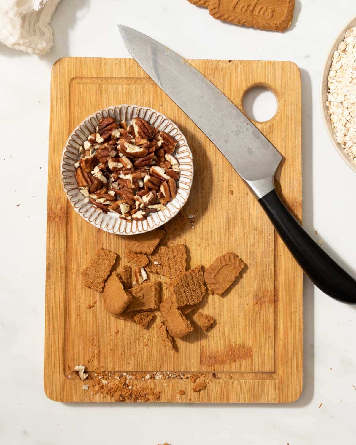 Cut up any nuts or cookies you want to add to the flapjack.