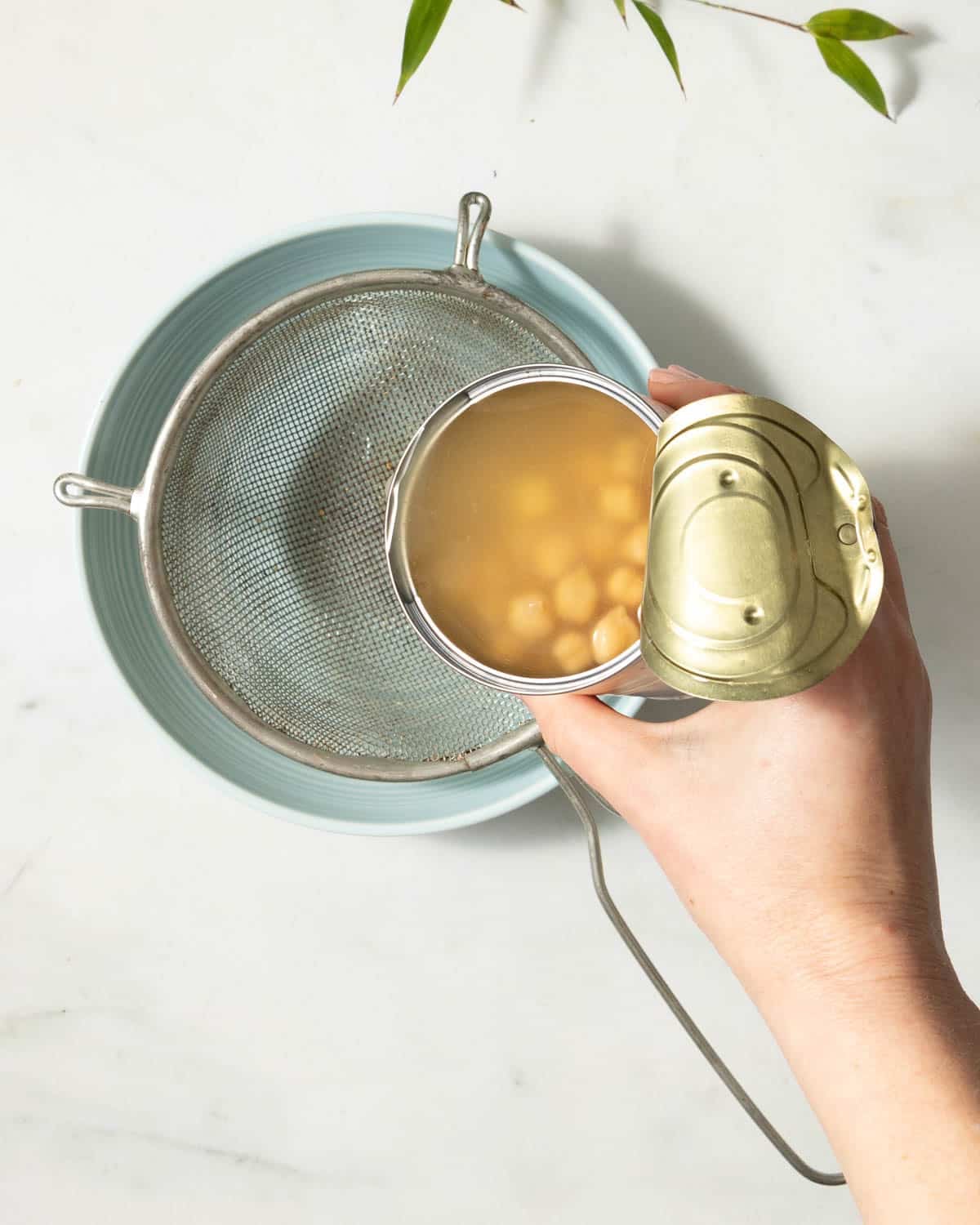 Drain the chickpeas reserving the liquid.