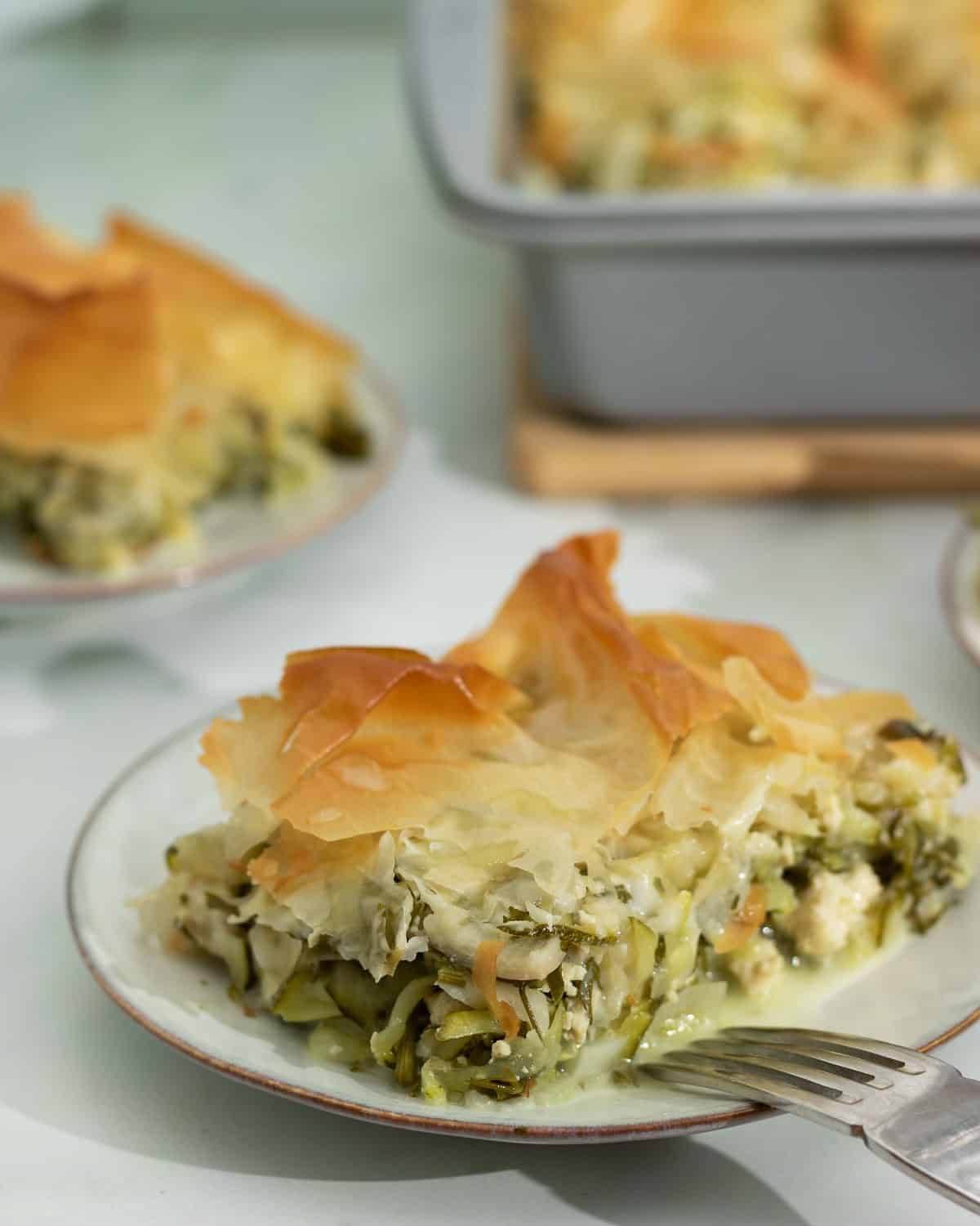 Vegan zucchini pie on a plate ready to eat. 