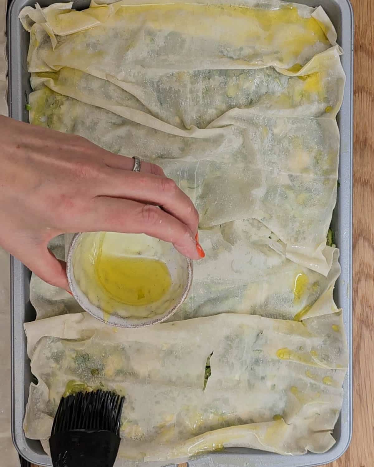Lay the rest of the filo layers over the top, with olive oil, scrunch up to be pretty.