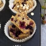 Blackberry and banana muffins with one open ready to eat.