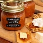 Tomato and onion chutney with cheese and crackers.