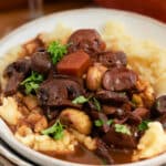 A bowl of chestnut and mushroom bourguignon ready to eat.