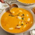 Carrot and butter bean soup ready to eat.