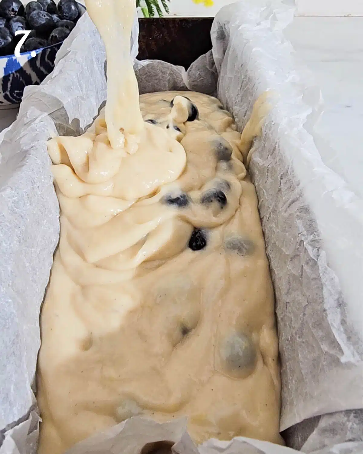 Pour out the batter into a parchment lined baking tin.