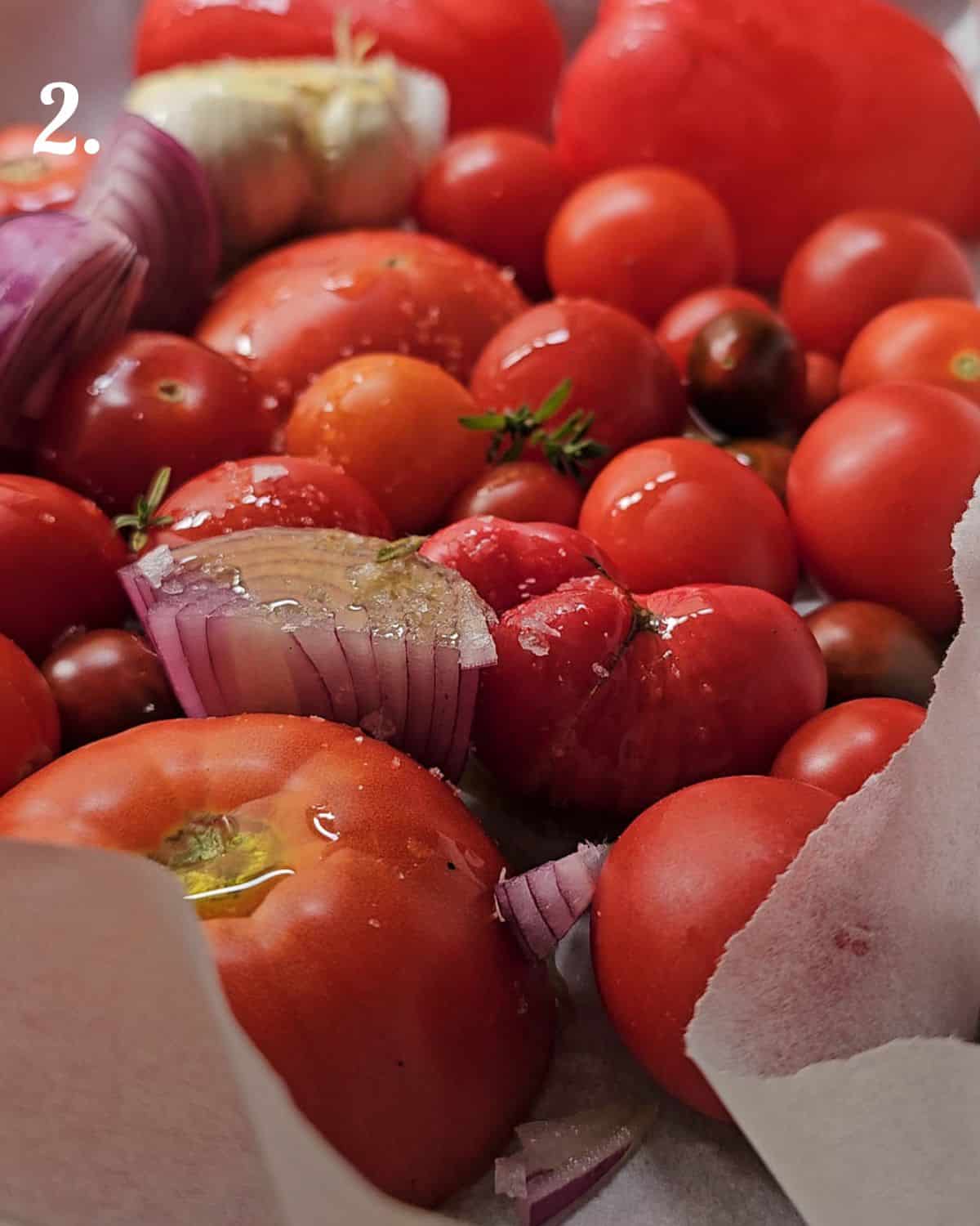 Season the tomatoes and peppers with thyme, salt, pepper and olive oil.