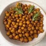 A bowl of crispy chickpea snacks ready to eat.