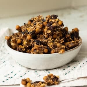 A bowl of savoury chickpea granola ready to snack on.