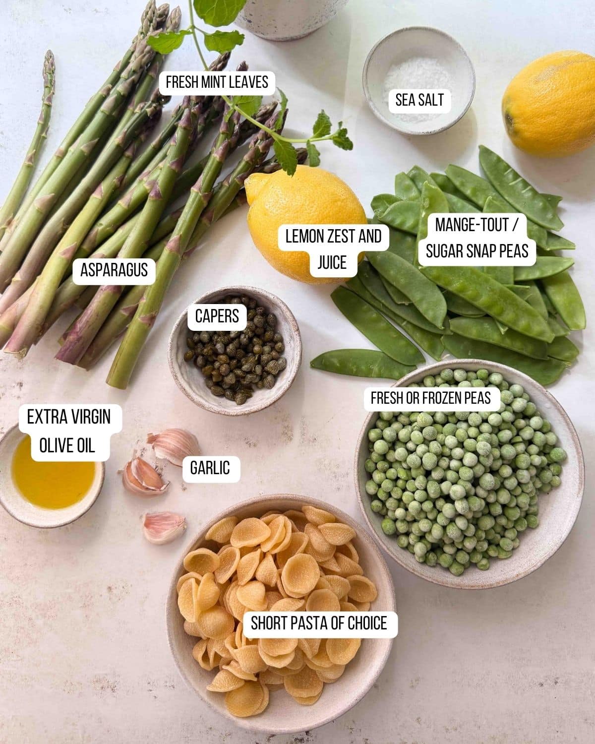 Ingredients for the asparagus and pea pasta salad laid out ready to use.