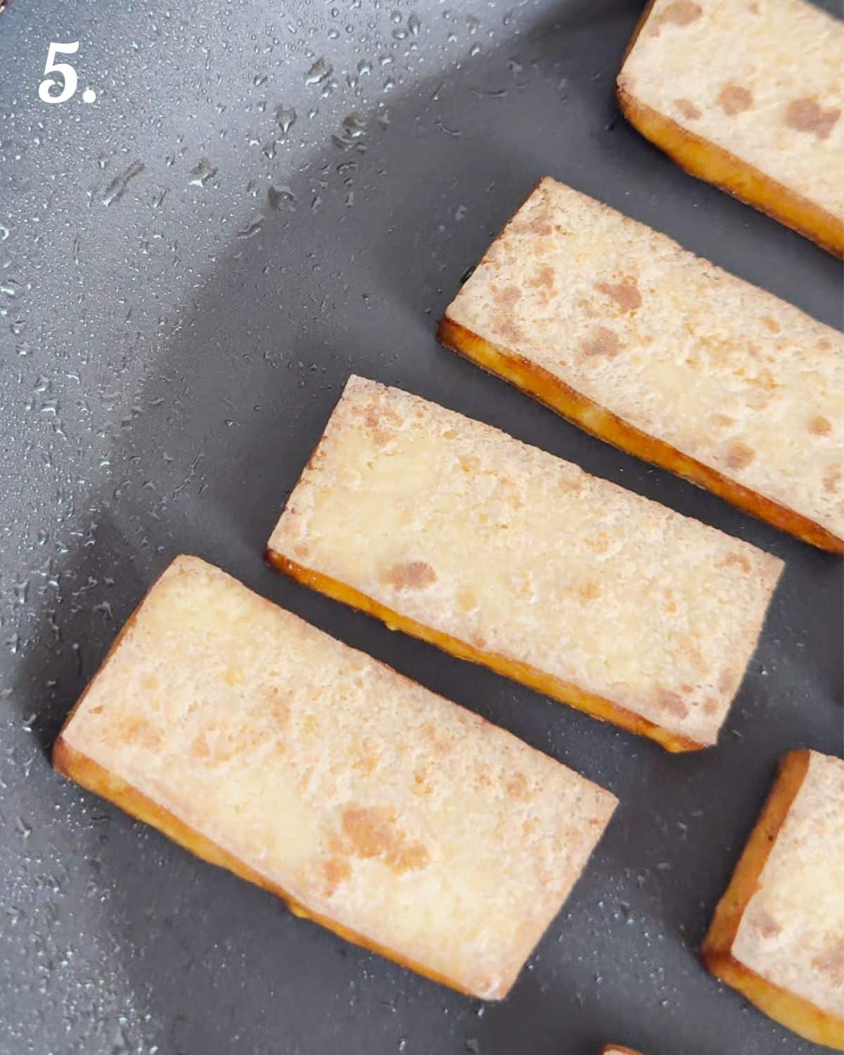 Pan fry the smoked tofu until crispy. 