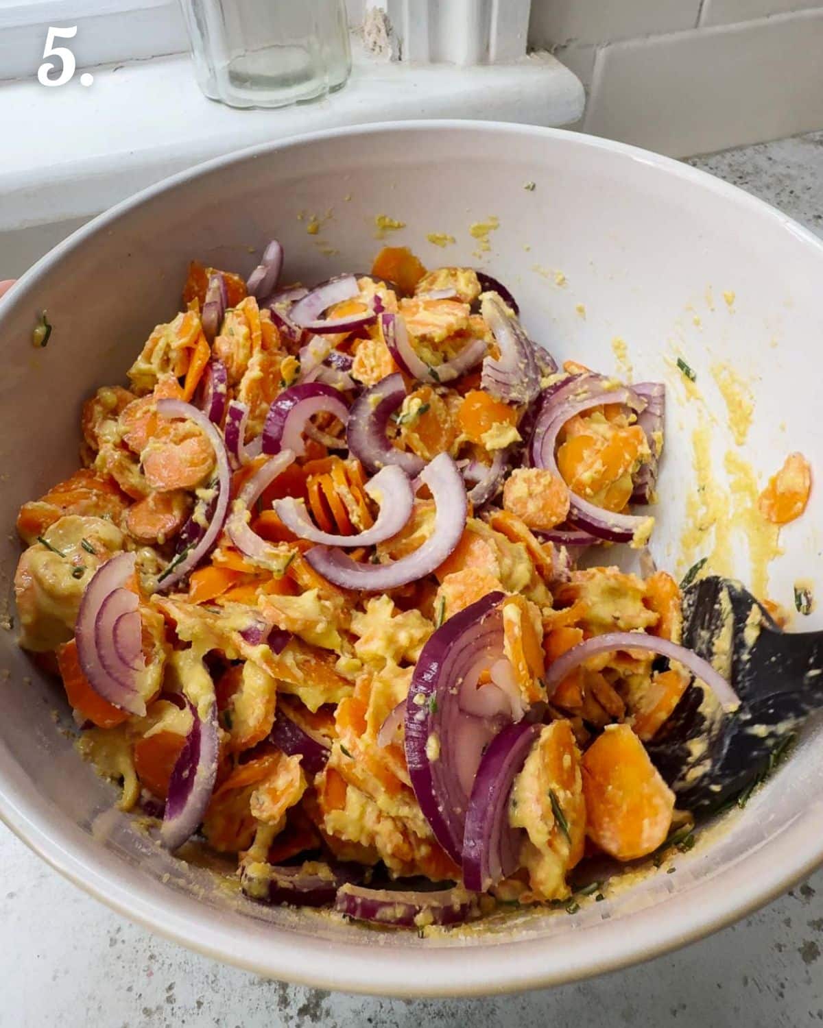 How the carrots and onions should look when mixed into the tart batter.