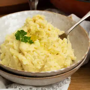 mashed potatoes with a spoon in it ready to serve.