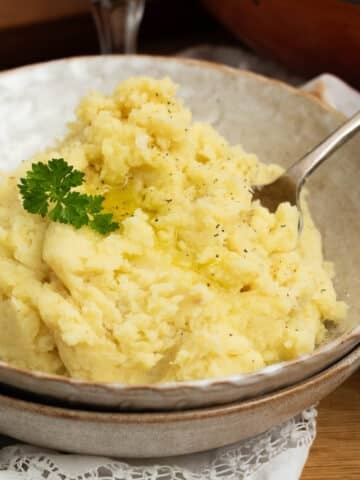mashed potatoes with a spoon in it ready to serve.