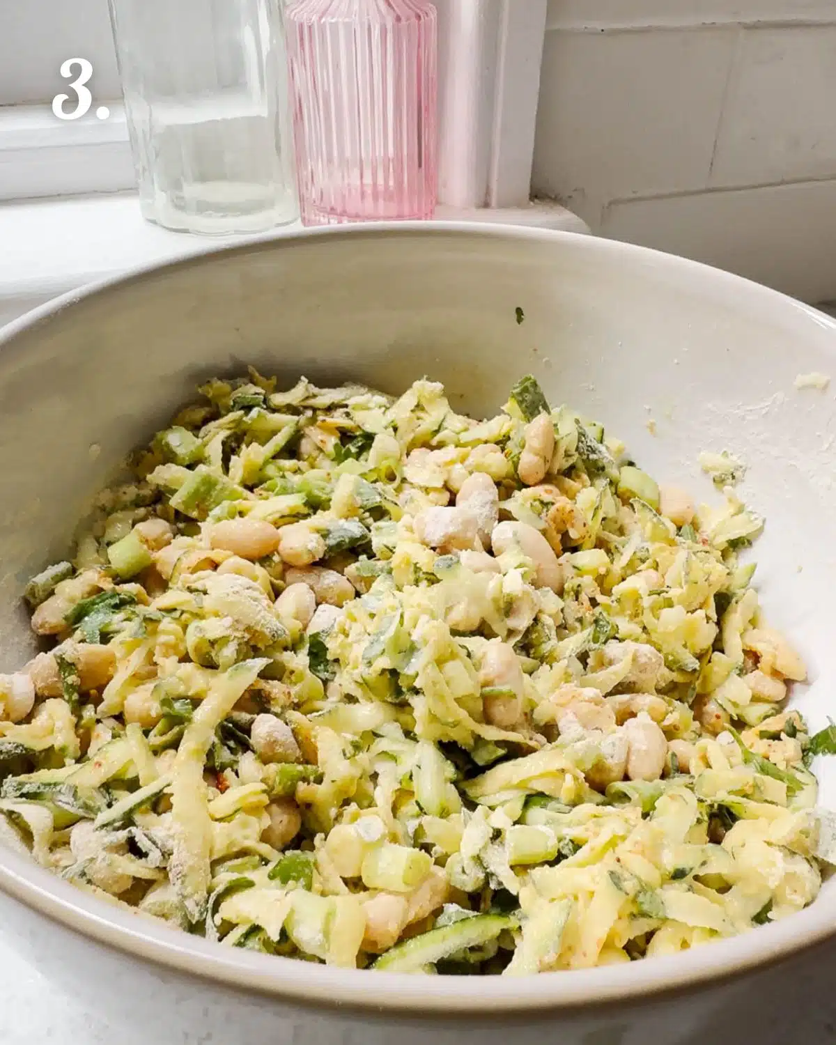 Mixing up all the dry ingredients so that they are evenly distributed.