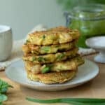 A stack of zucchini and white bean fritters ready to serve.