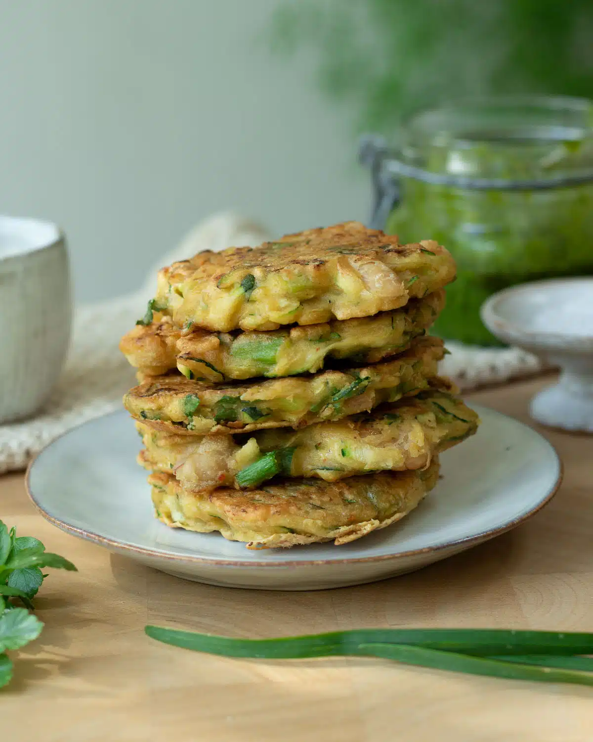  stack of zucchini and white bean fritters ready to serve.