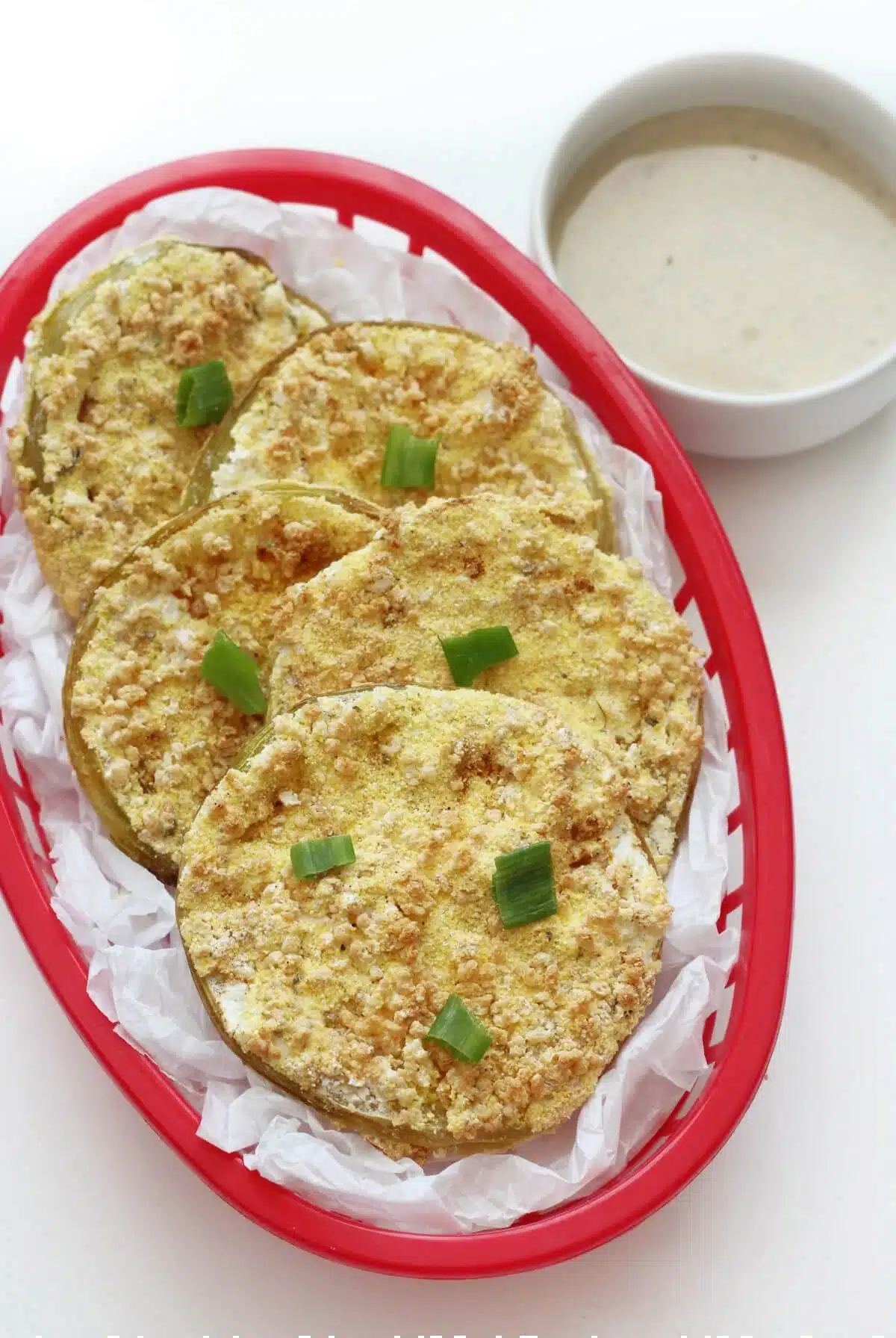 A plate of fried green tomatoes ready to eat.
