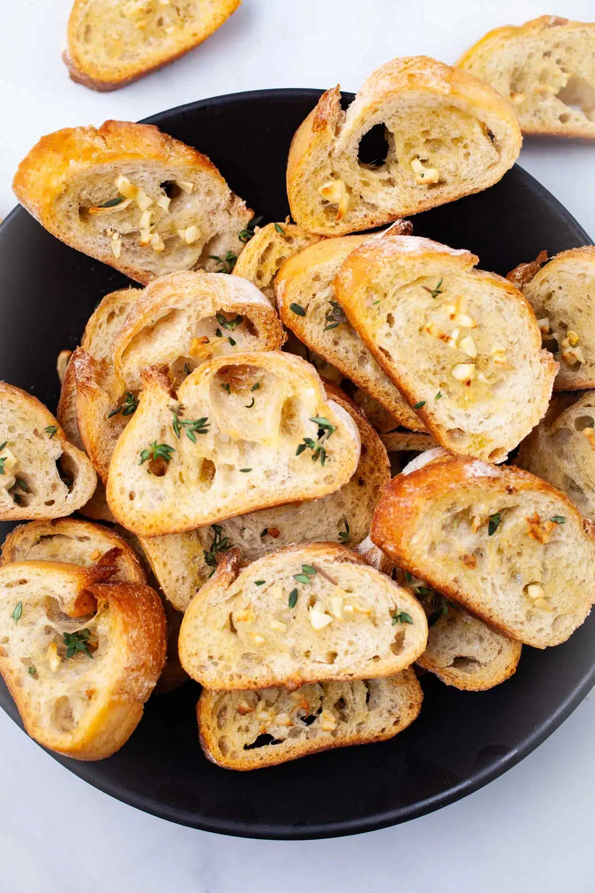 Garlic Crostini on a plate ready to eat.