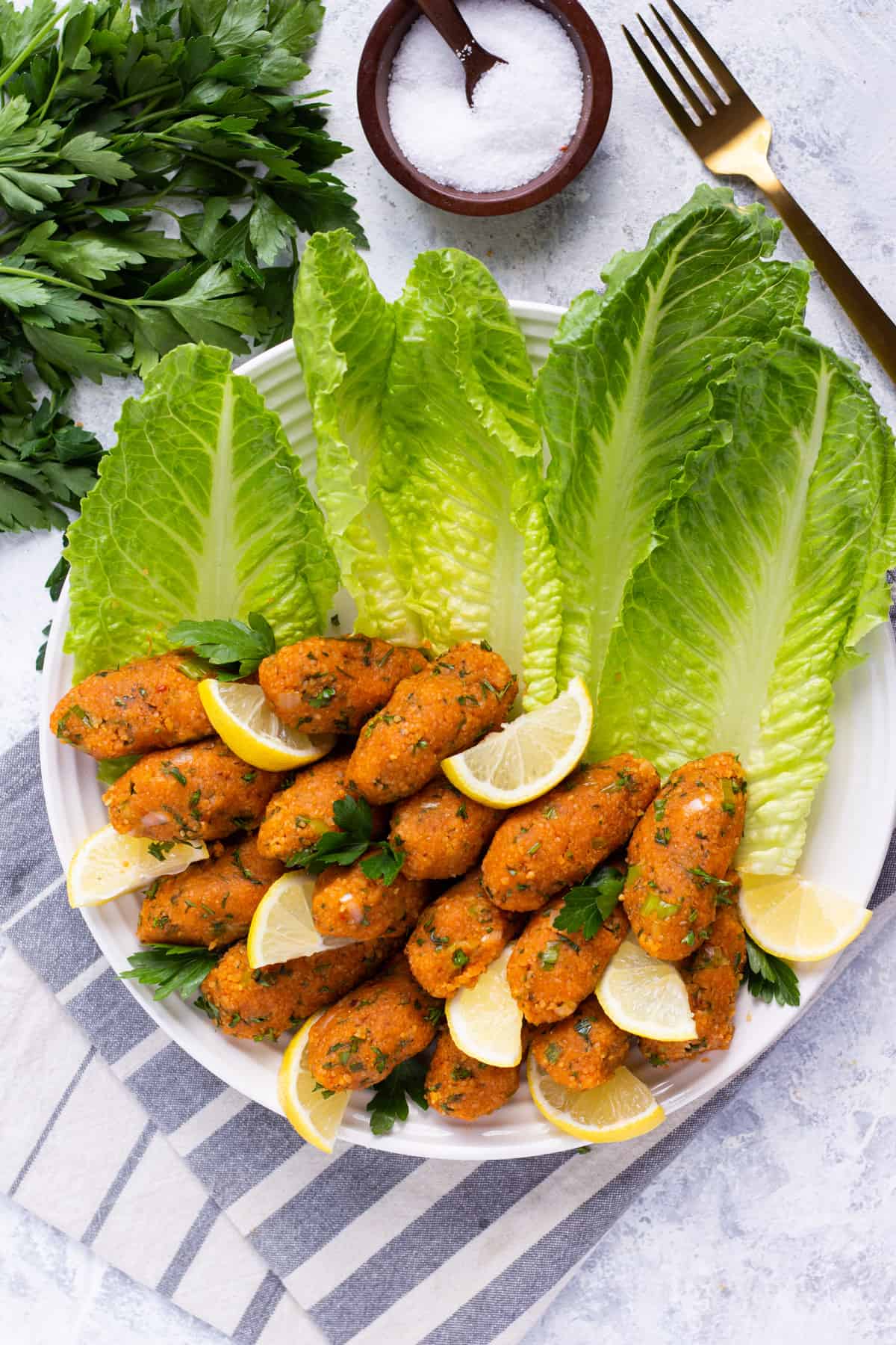 Vegan Lentil Balls (Kofta) on a bed of lettuce ready to eat.