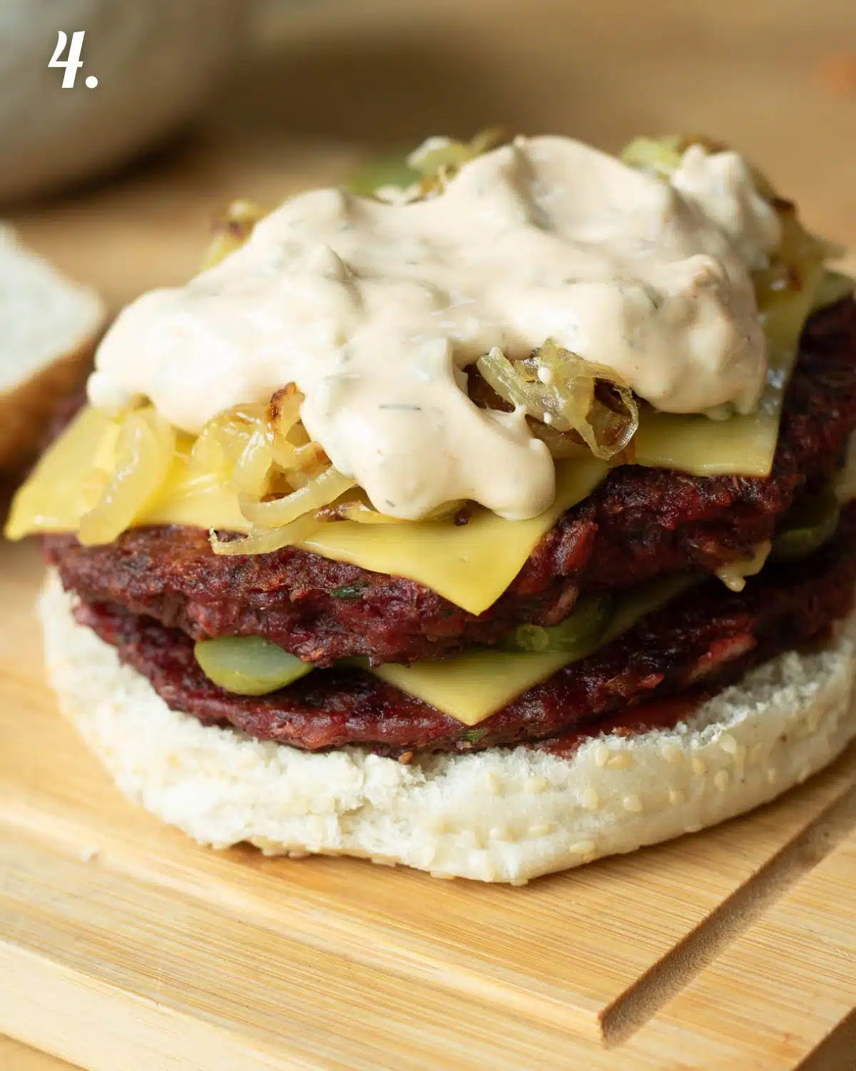 Showing the construction of a beet burger.