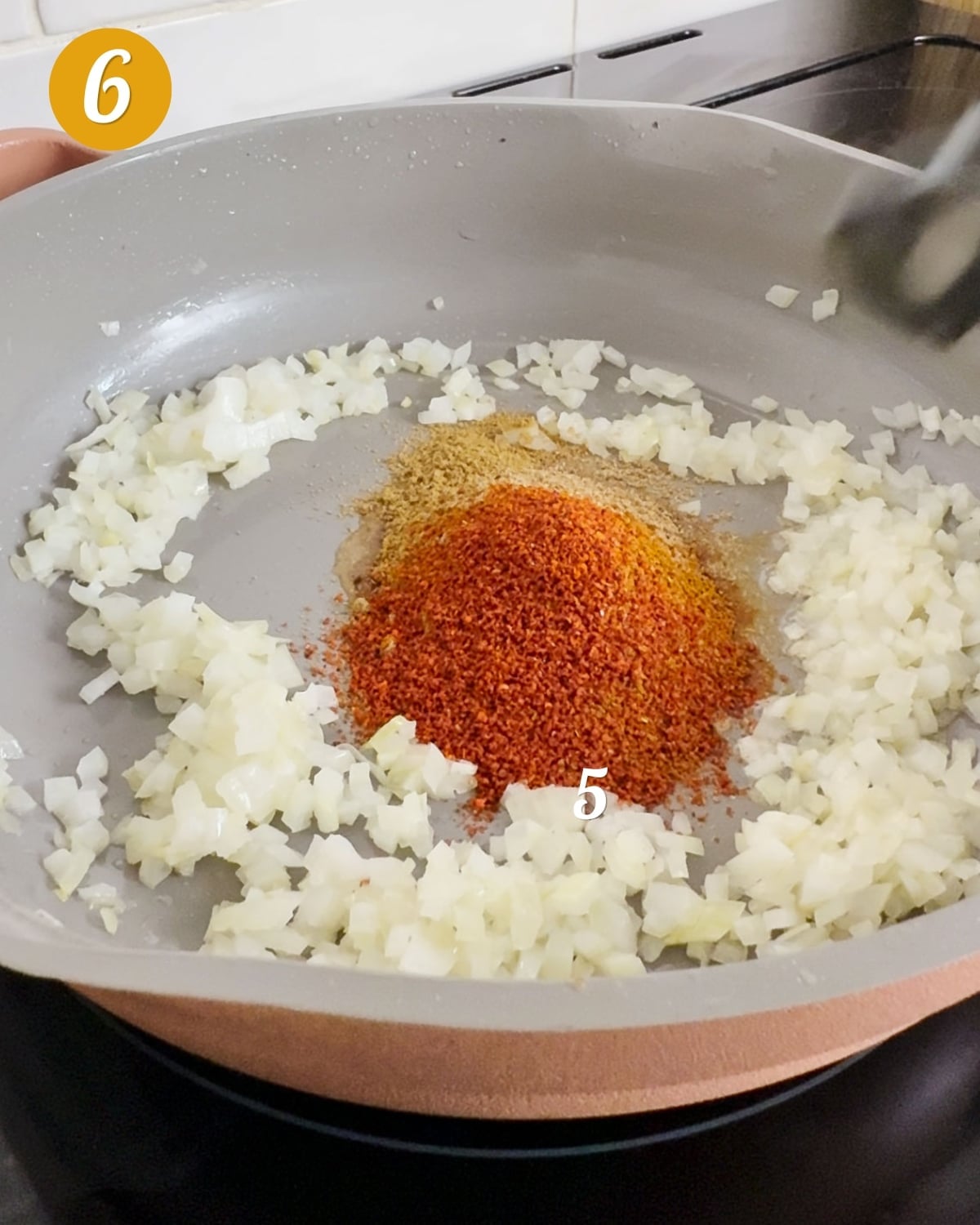 Cook down the onion in a large pan, then add the spices.