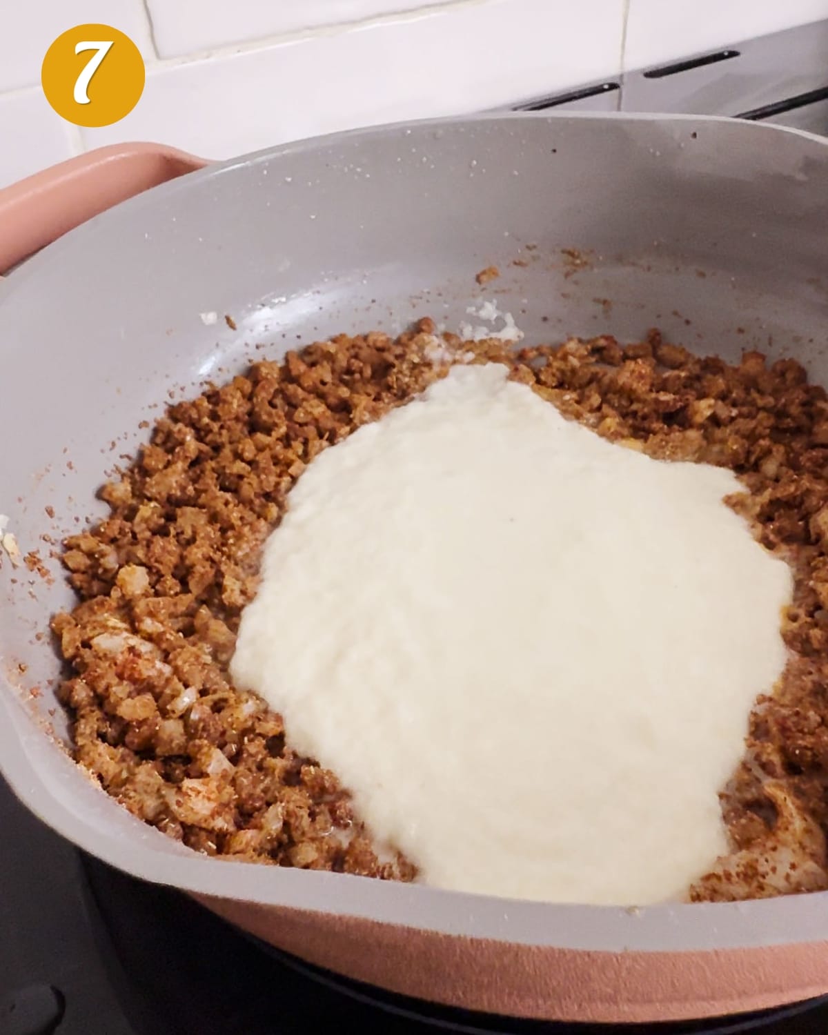 Add the ginger garlic mixture to the spices and let it bubble a minute.