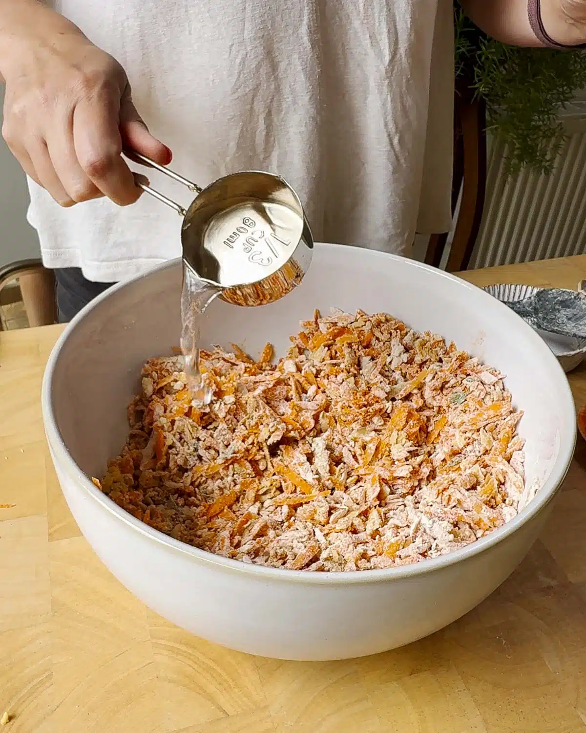 Add water to the bowl and mix until combined.